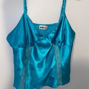 Very cute silk top/lingerie. Beautiful color. Lightly worn.